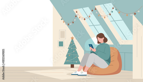 Cozy woman using phone in a decorated attic room winter holidays technology and relaxation