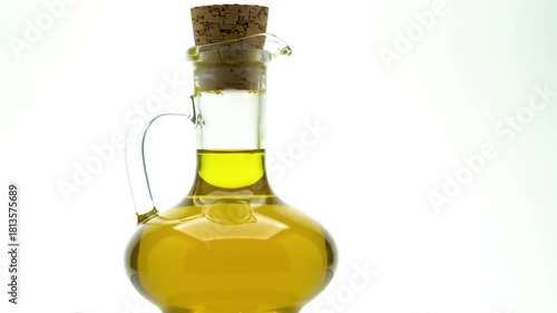 Olive Oil Decanter Sequence: A Collection of Golden Liquid in Glass Bottles with Corks