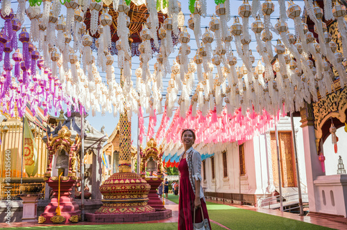 Young asian woman at the temple, Lamphun, Chiang Mai, Thailand