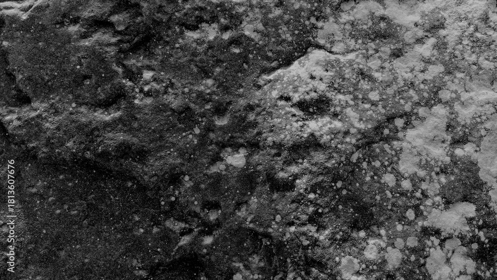 Fototapeta premium Dark rough rock texture with natural stone patterns and gritty surface details for backgrounds