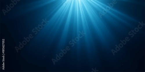 Abstract blue sun rays burst on a dark water backdrop, creating a bright glow and motion