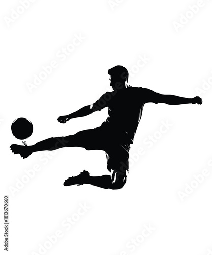 Dynamic silhouette of a soccer player in mid air kicking the ball with intense focus silhouette
