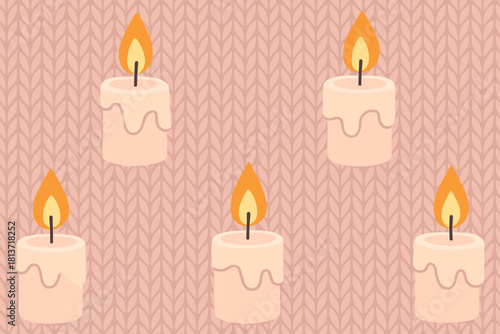 Seamless pattern of lit candles on knitted fabric background