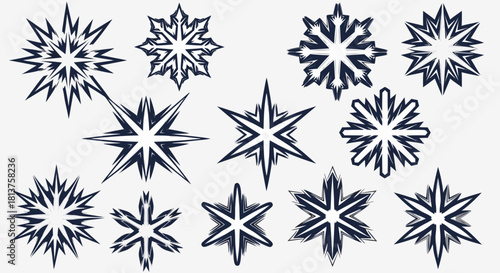 A collection of stylized dark blue snowflake and star-like shapes on a light background, showcasing various intricate designs.