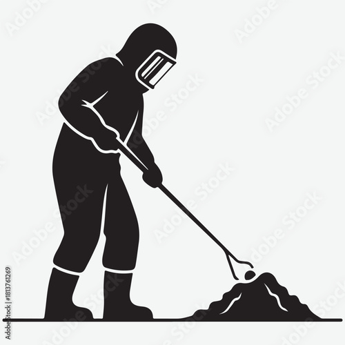 Person in Hazmat Suit Using Tongs to Pick Up Object from Pile
