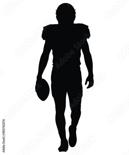 Silhouette of a football player holding a ball