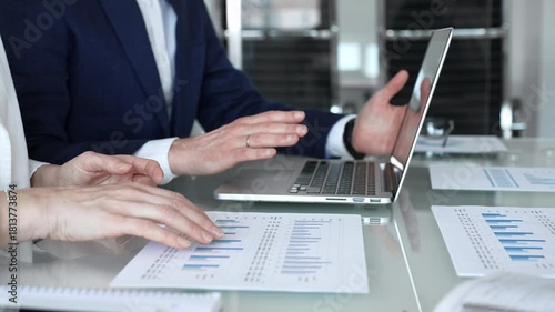 Wallpaper Mural Businesspeople hands gesturing and reviewing contracts on a glass table during an important negotiation, concluding a deal in a professional corporate environment Torontodigital.ca