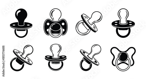 A collection of black and white baby pacifier icons in various styles