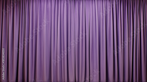 Luxurious purple stage curtain with soft folds and empty copy space for text or design
