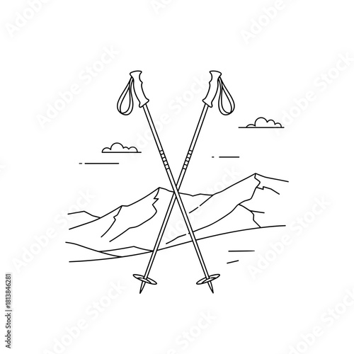 Ski poles crossed in front of mountain landscape with clouds  