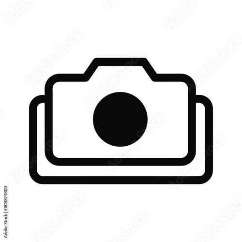 Simple black outline icon of a camera isolated on