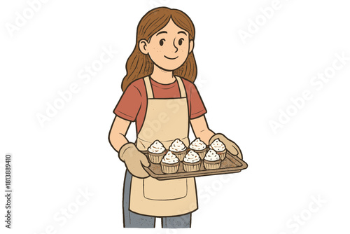 Young woman baker holding a tray of freshly baked cupcakes with frosting and sprinkles