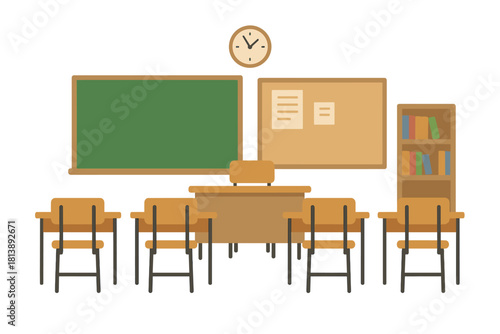 Empty school classroom with student desks, teacher table, chalkboard, and bulletin board