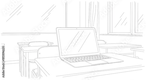 Laptop on desk in classroom setting for education and learning.