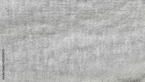 Fotografie gray ribbed knitted fabric close-up texture with horizontal lines