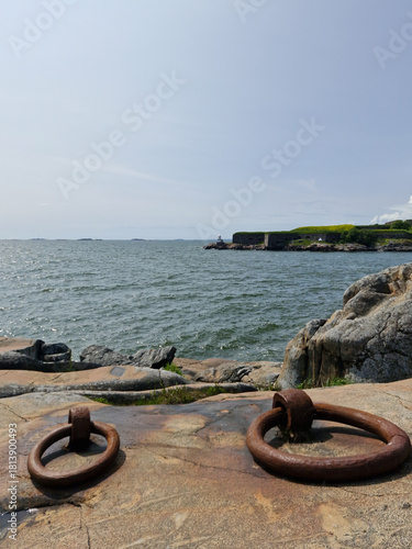 Suomenlinna sea fortress in Helsinki seen from Vallisaari island cliffs