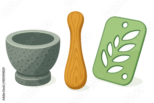Kitchen tools set featuring a stone mortar, wooden pestle, and a green spice stencil