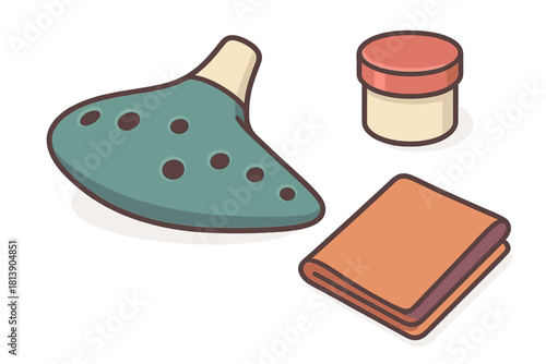 Ocarina wind instrument, small container, and folded textile in isometric perspective