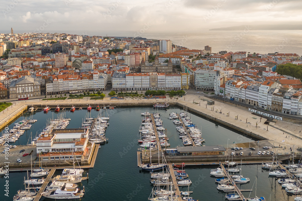 Fototapeta premium Aerial view of A Coruna cityscape at sunrise in Galicia, Northern Spain.