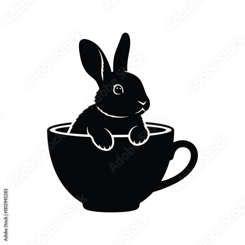 Black silhouette rabbit in teacup cute bunny whimsical animal isolated on white background