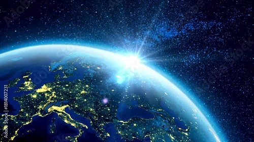 Earth at night from space with city lights visible and stars in the background view