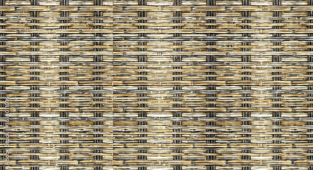 Obraz premium Detailed closeup of a tightly woven horizontal and vertical pattern of alternating light brown and dark brown strips