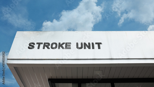 Photos Stroke Unit word signage on a medical or hospital building under a blue sky, sym