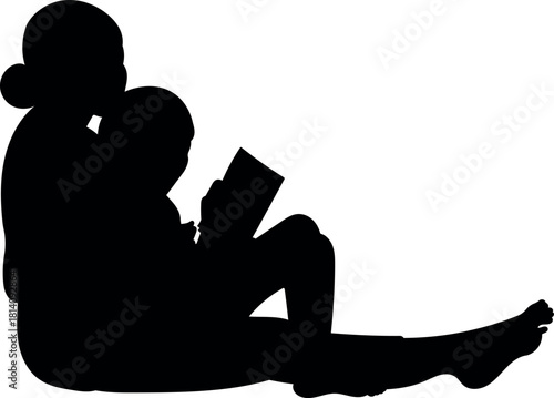 Mother reading a storybook to her child silhouette
