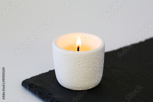 Wallpaper Mural White ceramic scented candle burning Torontodigital.ca