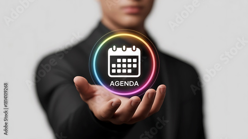 Man holds agenda icon displaying schedule and time management planning
