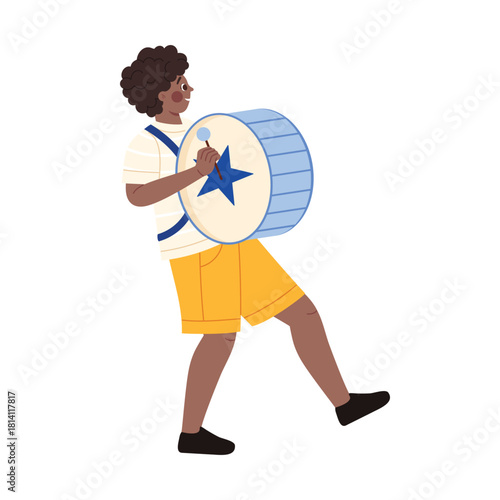 A young drummer joyfully plays a vibrant, colorful parade drum, truly embodying the awesome energy of celebration