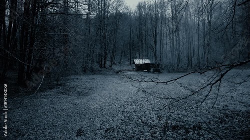 Abandoned haunted farm house in the misty forest
