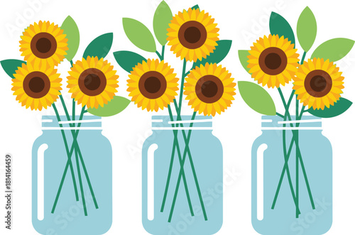 Three clear glass mason jars filled with vibrant yellow sunflowers and green leaves arranged in a row against a white background evoking a rustic and cheerful summer or autumn harvest