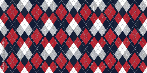 Colorful argyle pattern featuring red, white, and navy diamonds in a stylish repeated design.