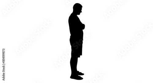 Silhouette of thoughtful man standing with arms crossed contemplating life's direction, ideal for conveying pensive moments of reflection and decision making