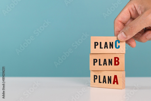 A man choose Plan C over Plan A and Plan B. Backup plan, multiple plans, strategies and option concept