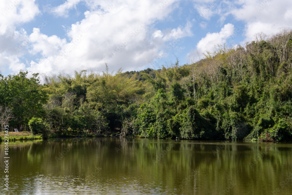 Fototapeta premium Scenic view of Pugu Hills and its tranquil lake near Dar es Salaam, showcasing Tanzania’s natural beauty and peaceful landscapes.