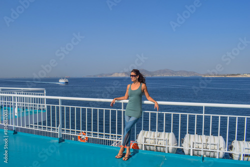 Traveler Enjoying the View from Ferry Deck