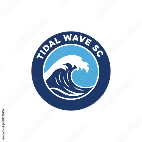A bold circular logo featuring a powerful breaking wave in blue tones, symbolizing strength, energy, and motion for Tidal Wave SC and its dynamic coastal identity.