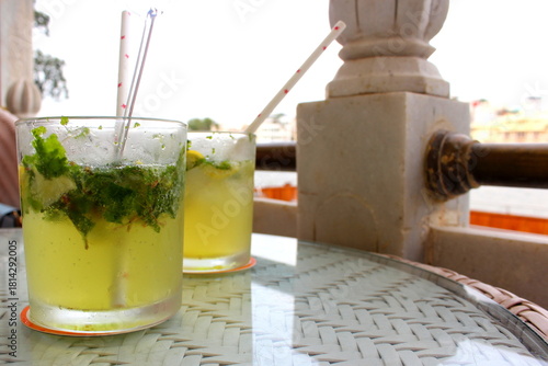 Refreshing drinks with crushed mint leaves and mixer