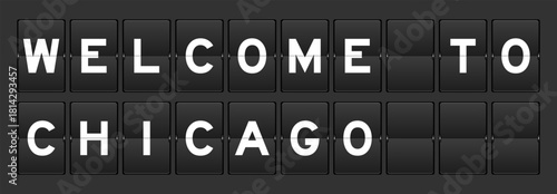 Black color analog flip board with word welcome to chicago on gray background