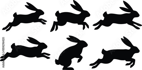 Black silhouette rabbits in various running and sitting poses vector illustration for design and decoration