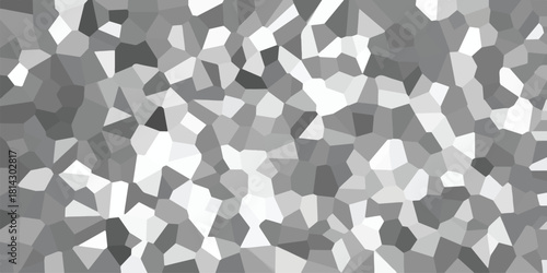 Geometric mosaic pattern in grayscale with irregular polygons and varying shades of grey creating a modern abstract background for digital and graphic design projects