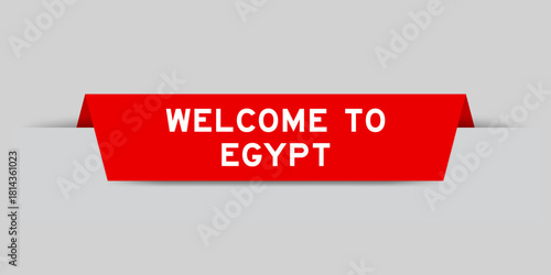 Red color inserted label with word welcome to egypt on gray background
