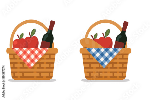 Pair of traditional wicker picnic baskets filled with wine bottle, fresh apples, and checkered cloth
