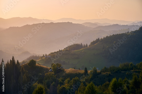 Natural panoramic mountains landscape in sunset. Ukraine, Carpathians, Spinzova Mountain.