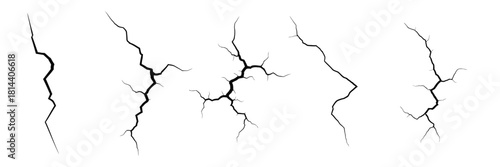 Five black cracks isolated on white background, indicating damage or wear