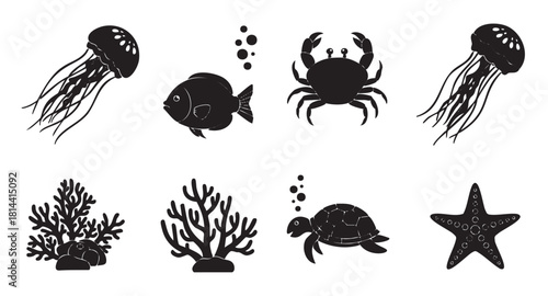 Collection of black silhouette icons featuring various sea animals and marine life, including jellyfish, crab, turtle, and coral