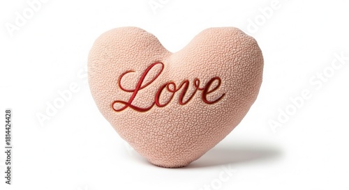 Heart-shaped pillow with the word 