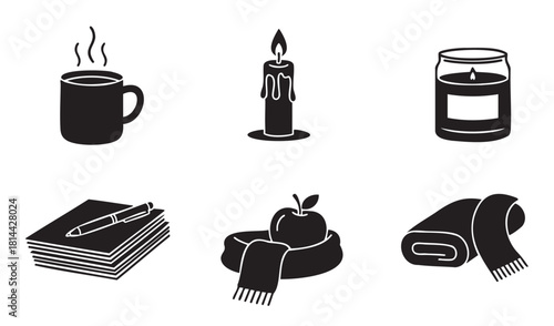 Collection of black silhouette icons representing a cozy and warm seasonal aesthetic with a steaming mug, lit candles, a journal, an apple, and a scarf